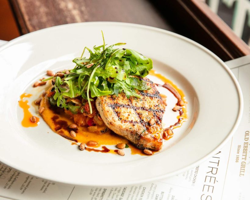 Pan-seared Chesapeake Bay rockfish with pine nuts at Old Ebbitt Grill in downtown D.C.