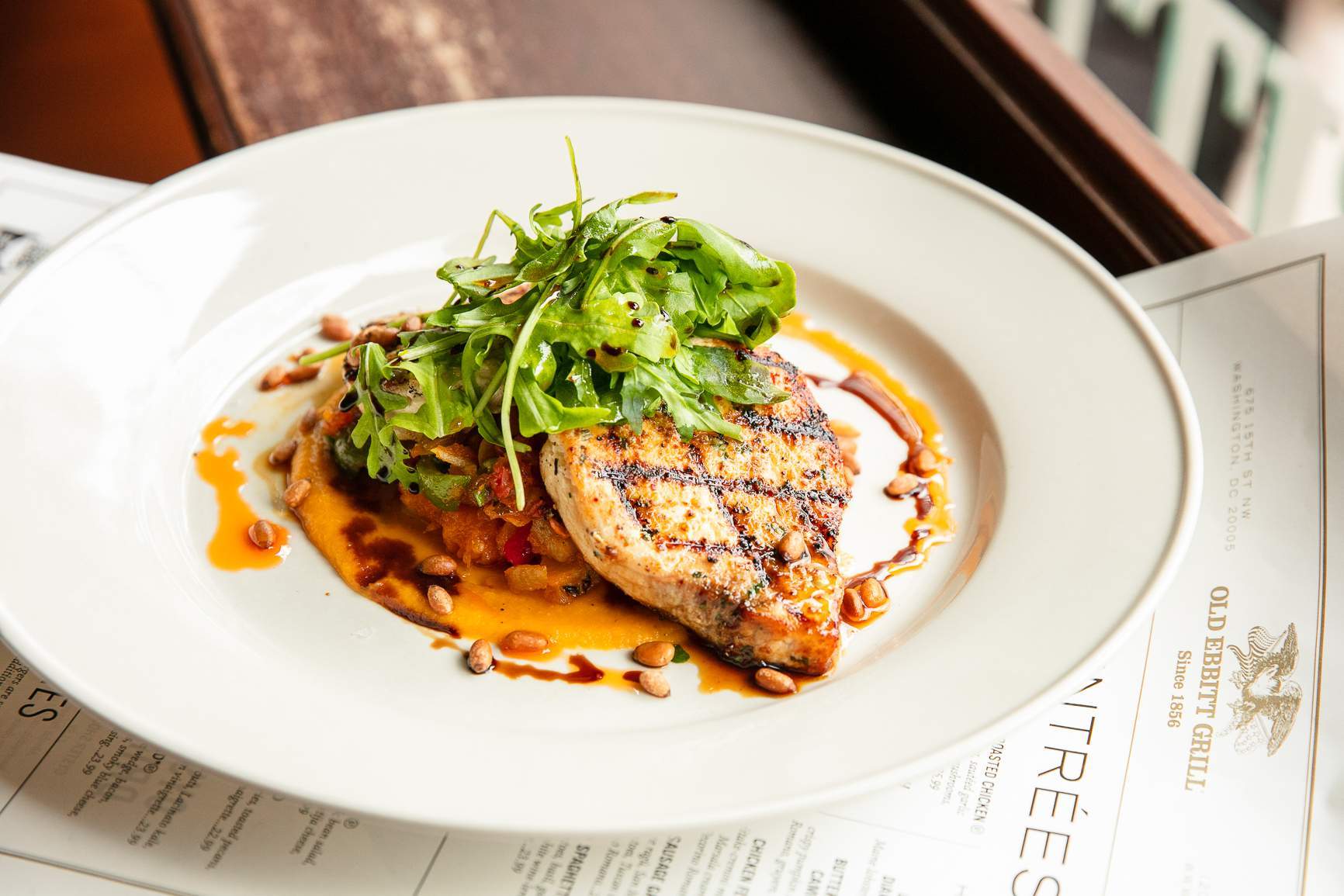 Pan-seared Chesapeake Bay rockfish with pine nuts at Old Ebbitt Grill in downtown D.C.