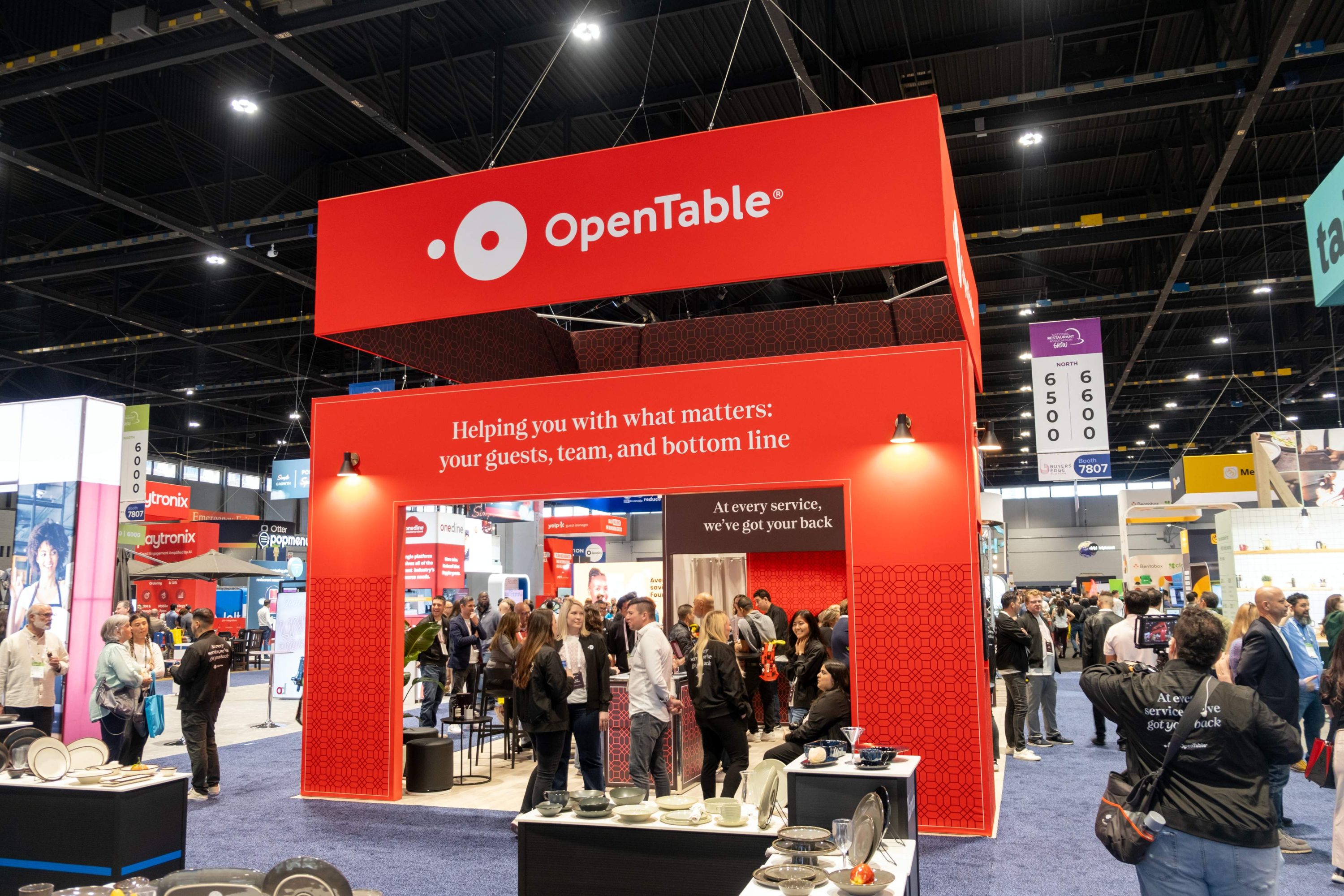 Busy OpenTable booth at a conference